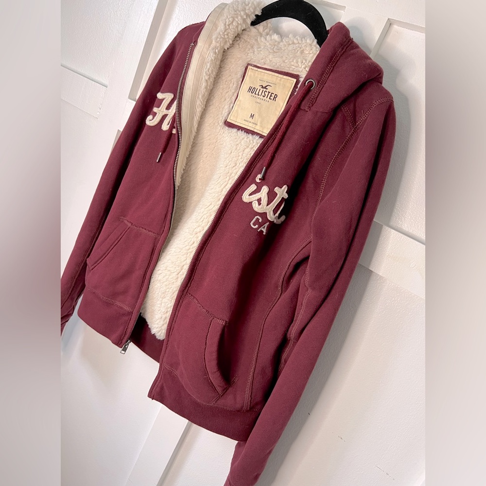 Women’s Hollister size medium burgundy, red white fur lined zip up hooded jacket